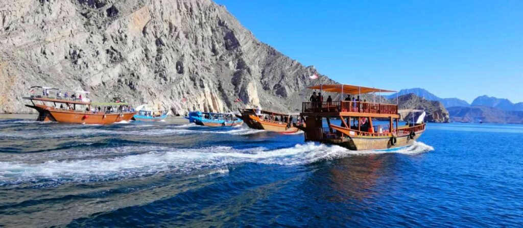 Dhows cruising in the Khasab fjords, Musandam
