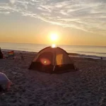 Khasab beach camping at sunset Tents on the beach at sunset on a Khasab camping trip