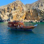 Traditional dhow on a half day cruise in the Musandam fjords near Khasab
