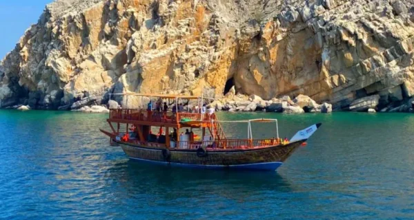 Traditional dhow on a half day cruise in the Musandam fjords near Khasab